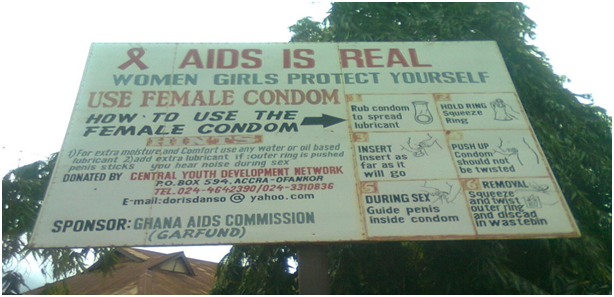 Signboard erected in LMKM to educate people on female condom use and HIV/AIDS prevention